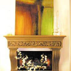 Colorful Contemporary Art Above Ornate Fireplace