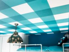 Blue Gingham Pattern on Ceiling With Industrial Light