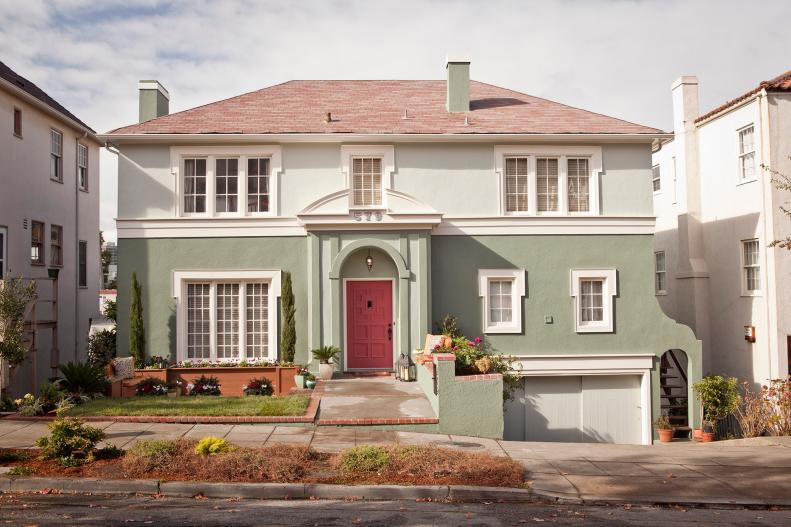 Mint Green Home Exterior With Red Front Door and Pediment Detail