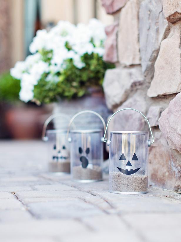 Add battery-operated tea lights to the buckets and your Halloween luminaries is ready to light your walkway.