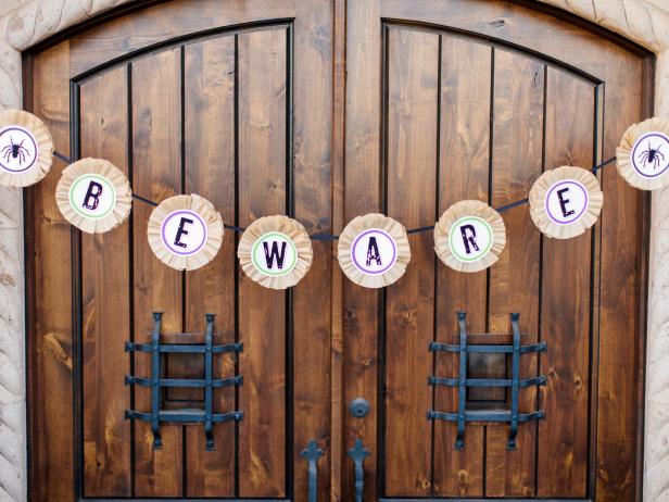 Turn brown coffee filters into a cute Halloween banner in a snap.