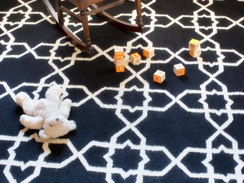 Black And White Graphic Weave Rug In Contemporary Nursery