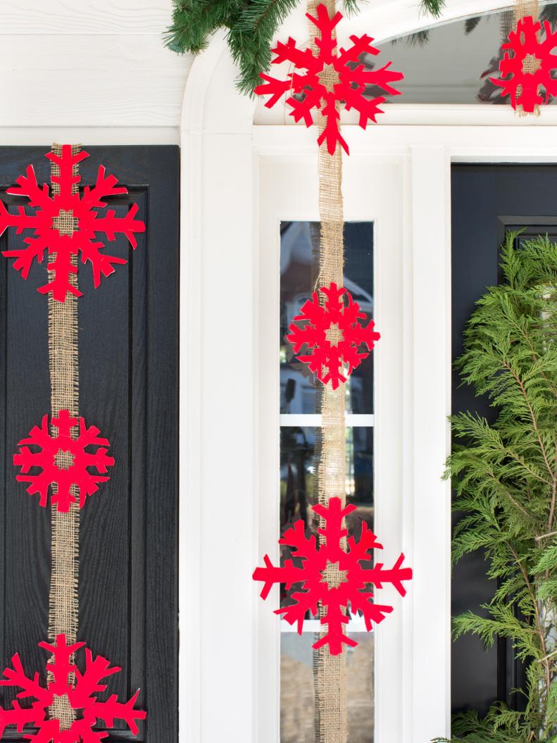 Lanyards made of felt, burlap and thick card stock add a graphic element to door frame.