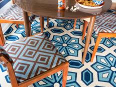 Vintage Dining Room With Orange Geometric Upholstered Chairs