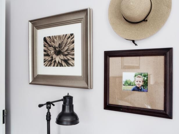 Framed Picture Gallery and Black Table Lamp