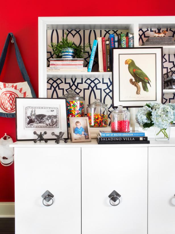 White Cabinet and Shelf With Red Wall