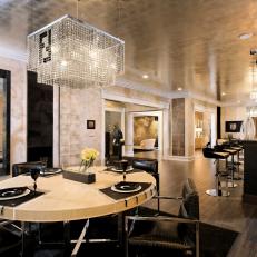 Black and White Dining Area With Crystal Chandelier