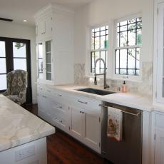 White Kitchen With Calacatta Marble Countertop and Backsplash 
