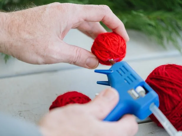 Making Red Yarn Ball Ornaments