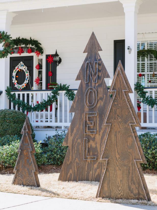 Outdoor, rustic, DIY Christmas tree, using plywood and nail heads.