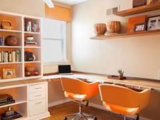 Contemporary Home Office With Wood Desk and Orange Accents