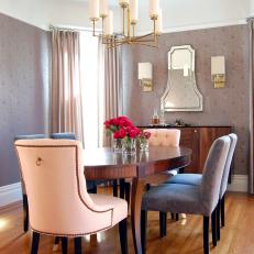 Pink and Gray Eclectic Dining Room With Chandelier