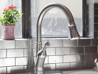 Kitchen Faucet and Stainless Steel Tile Backsplash