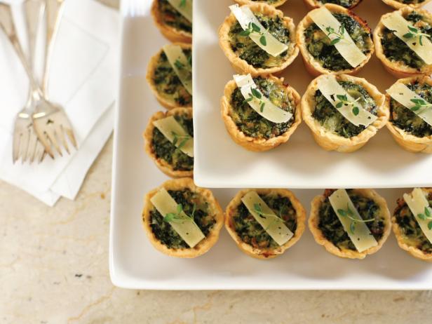 The classic combination of spinach and Swiss cheese paired with the fresh thyme and Parmesan make these bite-sized quiches an instant hit with even the pickiest eaters.