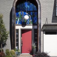 Dramatic Front Doorway with Stained Glass and Pendant Lighting