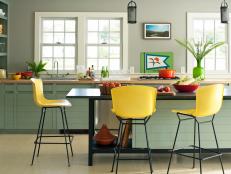 Transitional Eat-In Kitchen with Yellow and Black Chairs