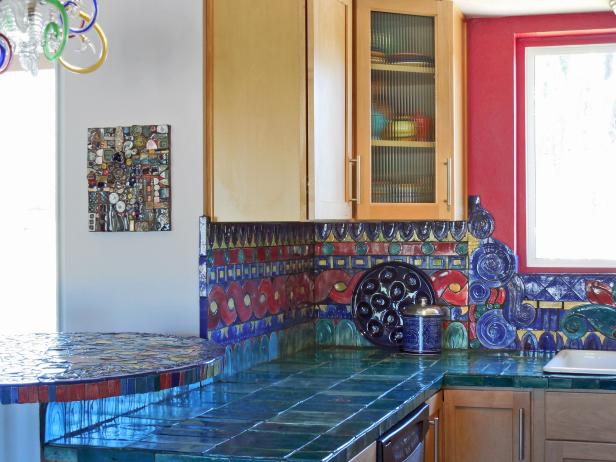 Mediterranean Kitchen with Multicolor Backsplash and Blue Tile Countertop