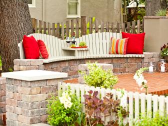 Brick and Wood Patio with Throw Pillows and Vivid Color