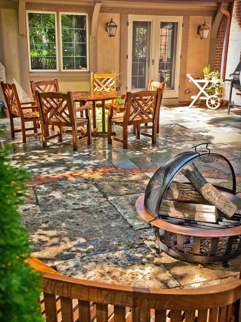 Fire pit and wooden outdoor table. 