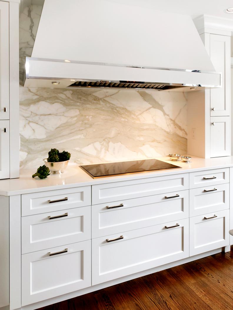 Contemporary White Kitchen Cabinets with Marble Backsplash