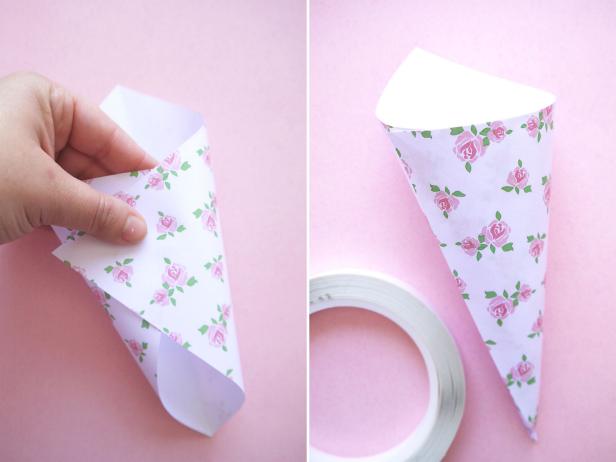 Roll the paper along the widest side to form a cone and secure with double-sided tape.