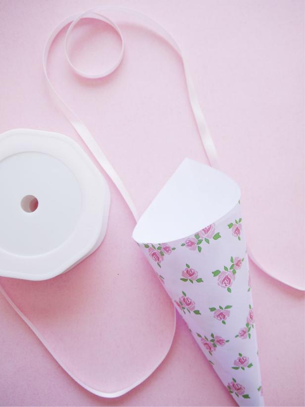 add ribbon to wedding confetti cone