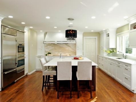 Spacious, Contemporary Kitchen With Marble Backsplash