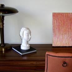 Wood Desk With Sculpted Head Figurine