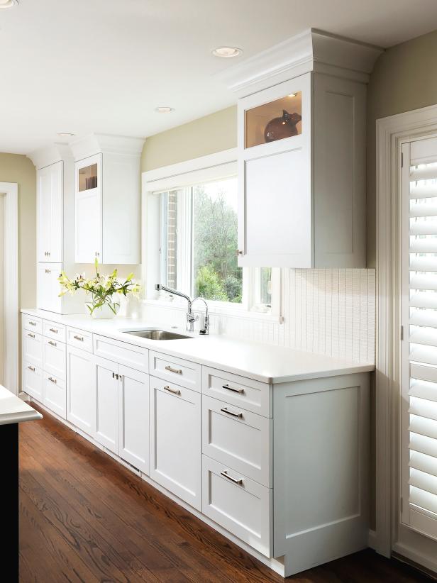 White Kitchen With White Beadboard Backsplash 