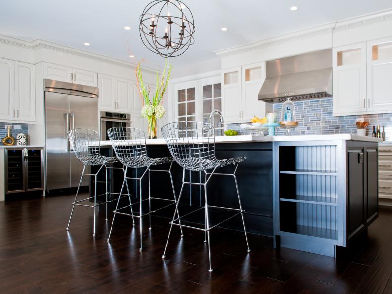 Contemporary Kitchen With Metal Barstools and White Cabinets 