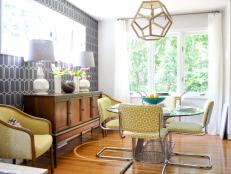 Gray Dining Room With Yellow and Chrome Chairs, Glass Table