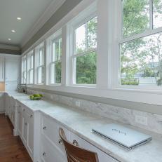 White Transitional Kitchen With Full-Wall Windows and Long Counter