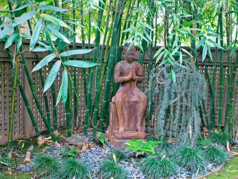 Asian Garden Statue Surrounded by Bamboo