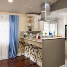 Neutral Kitchen Peninsula With Seating