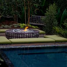 Luxurious Backyard With Fire Pit and Infinity Pool