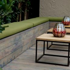 Contemporary Deck with Built-In Benches Topped with Green Cushions 