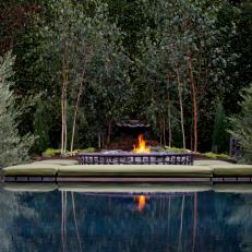 Backyard With Infinity Pool and Fire Pit