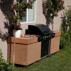 Outdoor Grill With Built-In Cabinet and Sink