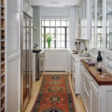 Tribal Rug Pops in Traditional White Kitchen