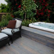 Traditional Wood Deck with Hot Tub and Lounge Chair