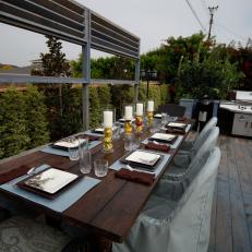 Contemporary Outdoor Dining Area with Grill