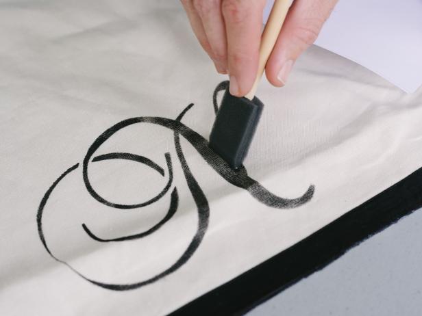 Foam Brush Painting Black Monogram on White Fabric