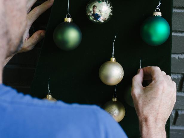 Insert ornament hooks into lightweight tree ornaments, then secure in place.
