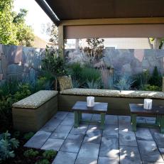 Outdoor Living Room With Stone Privacy Fence