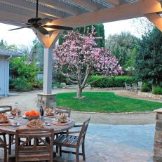 Elegant Patio With Wood & Stone Pergola