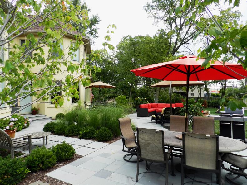 Stone Patio With Red Umbrella