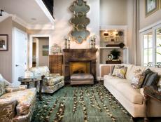 Designer Sandy Kozar maximizes a room's height and functionality with strategically placed design elements, creating a cozy and stylish family room.