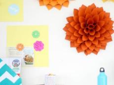 Create an oversized paper version of this stunning late-summer flower using materials you likely already have on hand: scrapbook paper, cardboard circles, scissors and double-sided tape.