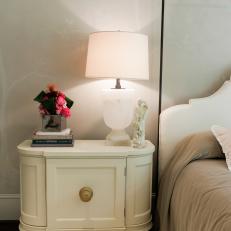 White Nightstand and Lamp With Elegant Tablescape Accessories