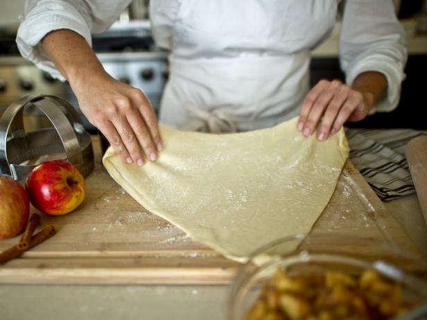 Clear workspace and roll out the pastry dough.